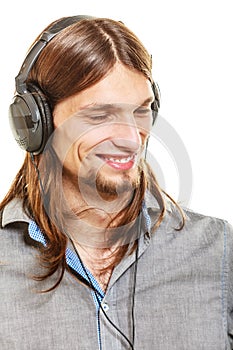 Man with headphones listening to music. Leisure.