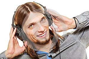 Man with headphones listening to music. Leisure.