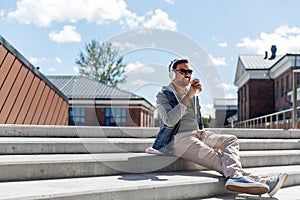 Man in headphones listening to music on roof top