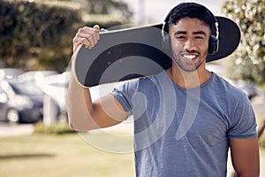 Man, headphones and portrait with skateboard in park or music playlist, exercise or hobby. Male person, smile and