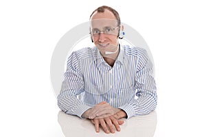 Man with headset working in a call center - isolated.