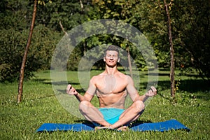 Man with healthy body meditate on yoga mat