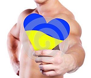 Man with heart with Ukrainian yellow and blue flag