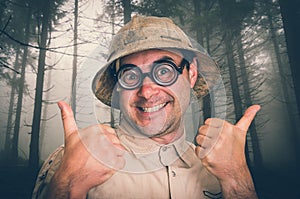 Man with helmet in scary forest in fog - retro style