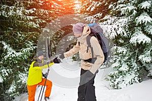 Man helping friend to climb.