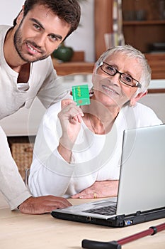 Man helping his mother