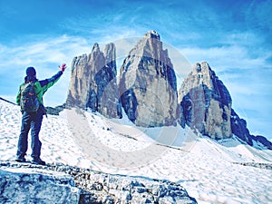 Man hiker with backpack on the Tre Cime di Lavaredo tour.