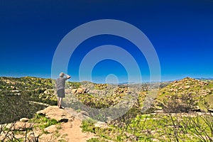 Man hiker mountain California Blue sky