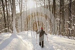 Man hiker on a snowy mountain