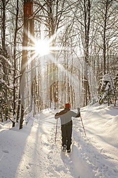 Man hiker on a snowy mountain