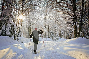 Man hiker on a snowy mountain