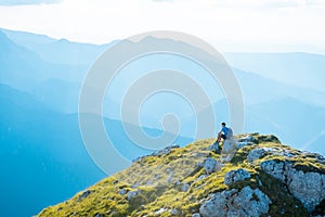 Man hiker on top of mountain