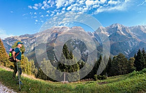 Man hiker watch the landscape of mountain in autumn.