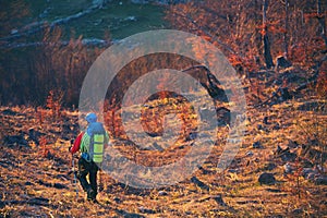 Man hiking descend to the mountain