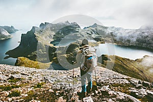 Man hiking in mountains enjoying Norway landscape