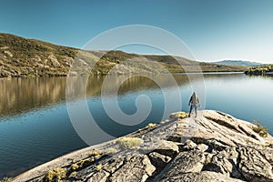 Man hiking near a beautiful lake