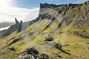 Man hiking through Scottish Highlands