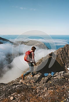 Man hiking solo on mountain ridge travel lifestyle adventures active outdoor vacation