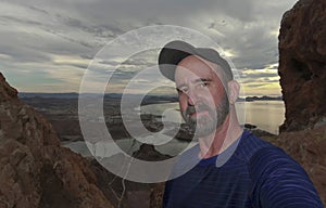 A Man Hiking Takes a Selfie on Tetakawi Mountain Above Los Algodones photo