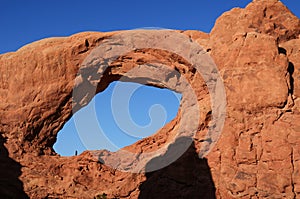 Man Hiking Under South Window Arch