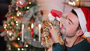 A man and his beloved cat during Christmas time