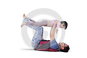 Man and his daughter playing together