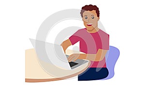 Man at his desk is working on the laptop computer