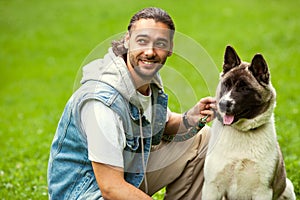 Man with his dog breed Aki photo