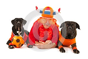 Man with his dogs as Dutch soccer supporters