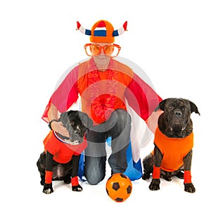 Man with his dogs as Dutch soccer supporters