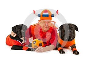 Man with his dogs as Dutch soccer supporters