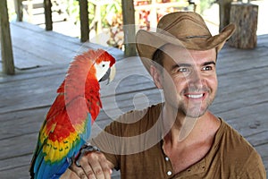 Man and his domesticated parrot