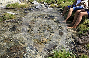 Man with his foots on the water