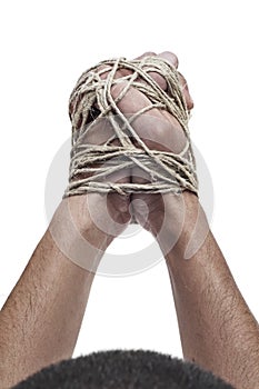 Man with his hands tied with rope