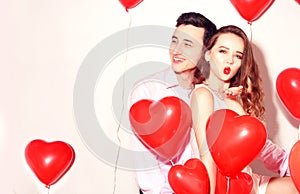 Man with his lovely sweetheart girl have fun at Lover`s valentine day. Valentine Couple. Couple happy. Girl send kiss.