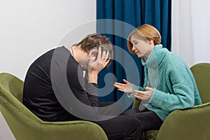 A man with his problems at a psychologists office. The patient is consulted with a psychologist. Psychological counselor concept