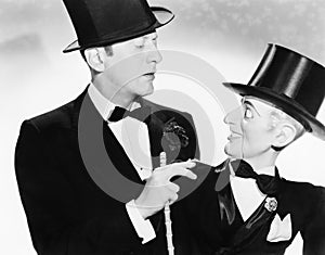 Man and his puppet looking at each other