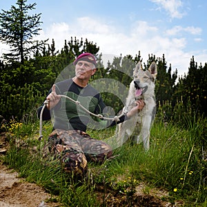 Man and his purebred Czechoslovakian wolf dog