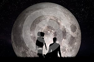 Man and his robot friend looking on moon. Future concept, artificial intelligence