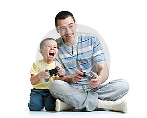 Man and his son child play with a playstation toge