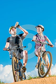 Man and his wife on bicycles