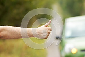 Man hitching car