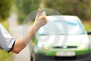 Man hitching on road