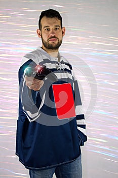Man in hockey sport dress invites you to play esports.Electronic sports are popular.