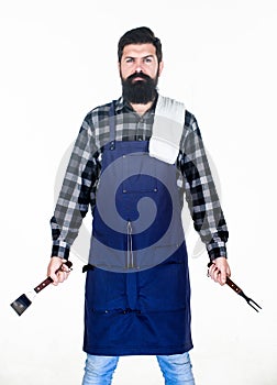 Man hold cooking utensils barbecue. Tools for roasting meat outdoors. Picnic and barbecue. Cooking meat in park