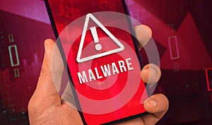 Man hold mobile phone with Malware warn screen, concept of cyber crime in the world