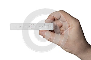 Man hold a negative antigen rapid test device for coronavirus covid-19 on a white background