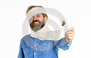 Man hold toilet paper. Hipster Guy having fun. Softness strength and absorbency. Prevent Toilet Paper Hoarding. Shortage