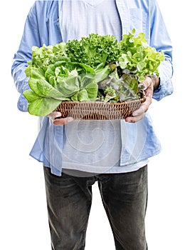 Man hold vegetables on rattan basket isolated on white background with clipping path