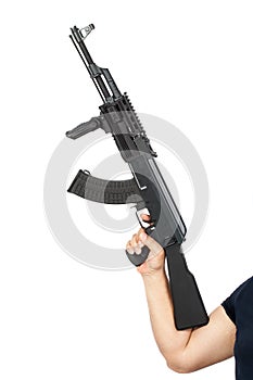 Man holding AK-47 machine gun isolated on white